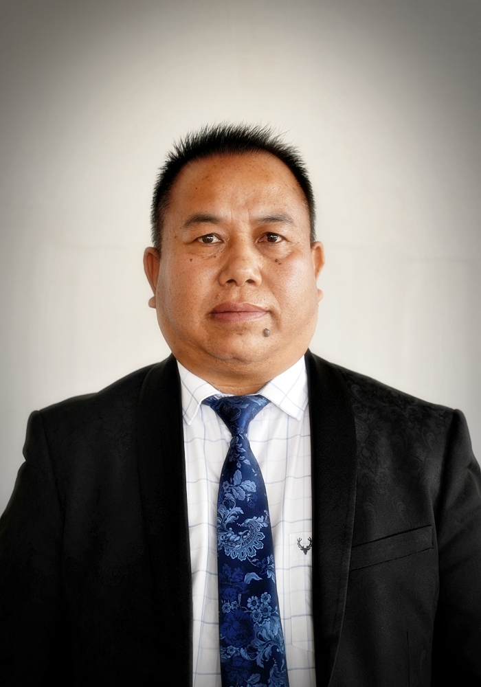 Rev. L. Solomon Kom, Executive Secretary